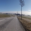 Abfahrt nach Oberwil, vor dem Alpenkamm im Hintergrund