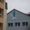 Zinnowitzer Wappen: Seepferdchen und Sanddornzweig